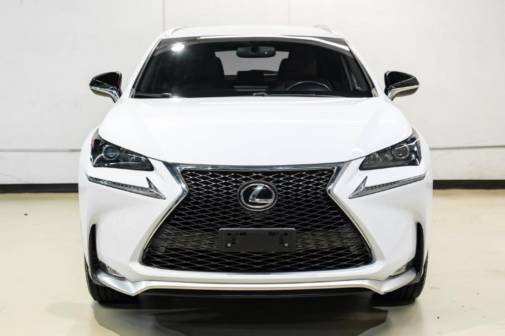 2017 Ultra White /F Sport Rioja Red Lexus NX 200t F Sport (JTJYARBZ1H2) with an 2.0L 16V DOHC engine, Automatic transmission, located at 15300 Midway Rd., Addison, TX, 75001, (972) 702-0011, 32.958321, -96.838074 - HOME OF THE NO HAGGLE PRICE - WHOLESALE PRICES TO THE PUBLIC!! 200t F Sport, 4D Sport Utility, 2.0L 16V DOHC, 6-Speed Automatic, FWD, Ultra White, F Sport Rioja Red Premium Synthetic. Odometer is 39824 miles below market average!<br><br>Ultra White 2017 Lexus NX 200t F Sport<br><br>Recent Arrival! 2- Photo#4