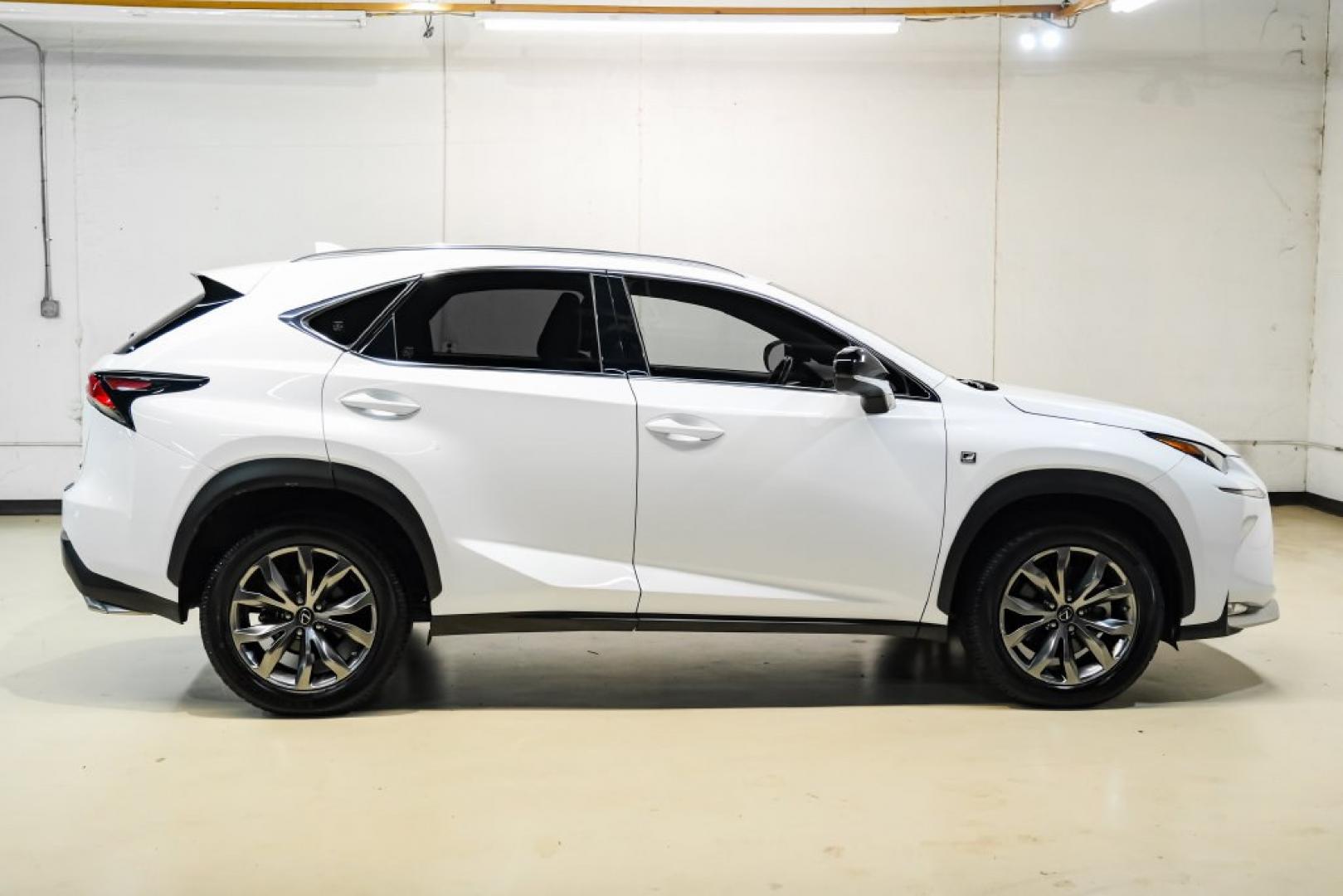 2017 Ultra White /F Sport Rioja Red Lexus NX 200t F Sport (JTJYARBZ1H2) with an 2.0L 16V DOHC engine, Automatic transmission, located at 15300 Midway Rd., Addison, TX, 75001, (972) 702-0011, 32.958321, -96.838074 - HOME OF THE NO HAGGLE PRICE - WHOLESALE PRICES TO THE PUBLIC!! 200t F Sport, 4D Sport Utility, 2.0L 16V DOHC, 6-Speed Automatic, FWD, Ultra White, F Sport Rioja Red Premium Synthetic. Odometer is 39824 miles below market average!<br><br>Ultra White 2017 Lexus NX 200t F Sport<br><br>Recent Arrival! 2- Photo#6