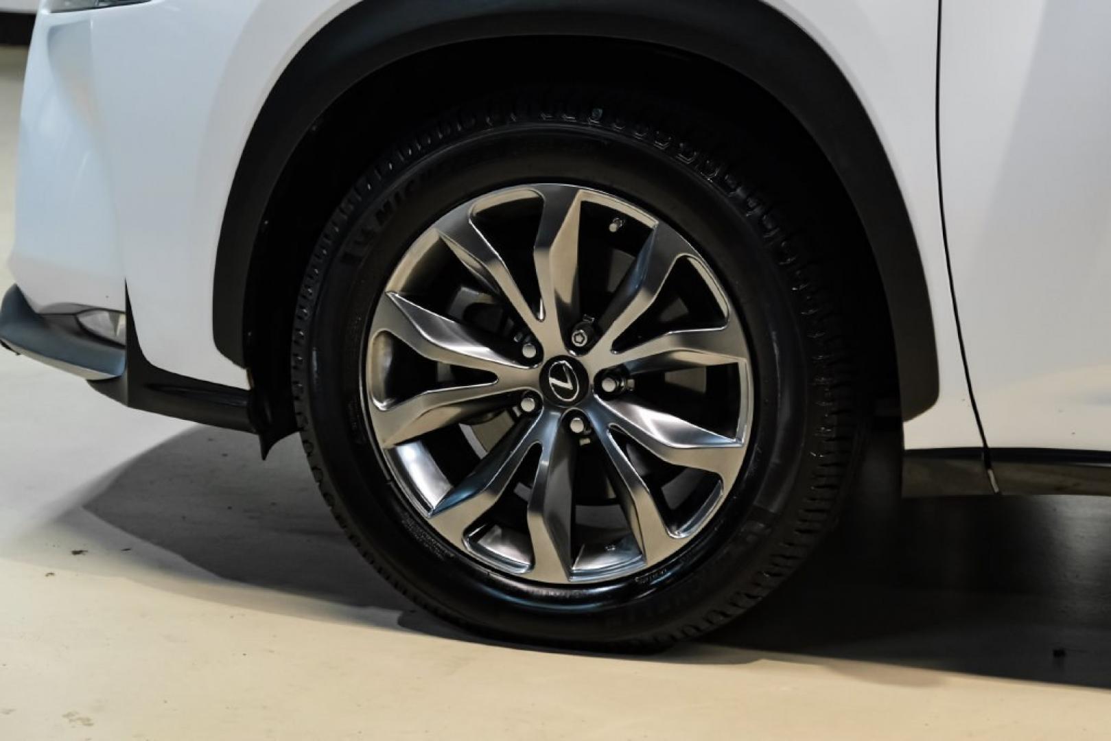 2017 Ultra White /F Sport Rioja Red Lexus NX 200t F Sport (JTJYARBZ1H2) with an 2.0L 16V DOHC engine, Automatic transmission, located at 15300 Midway Rd., Addison, TX, 75001, (972) 702-0011, 32.958321, -96.838074 - HOME OF THE NO HAGGLE PRICE - WHOLESALE PRICES TO THE PUBLIC!! 200t F Sport, 4D Sport Utility, 2.0L 16V DOHC, 6-Speed Automatic, FWD, Ultra White, F Sport Rioja Red Premium Synthetic. Odometer is 39824 miles below market average!<br><br>Ultra White 2017 Lexus NX 200t F Sport<br><br>Recent Arrival! 2- Photo#57
