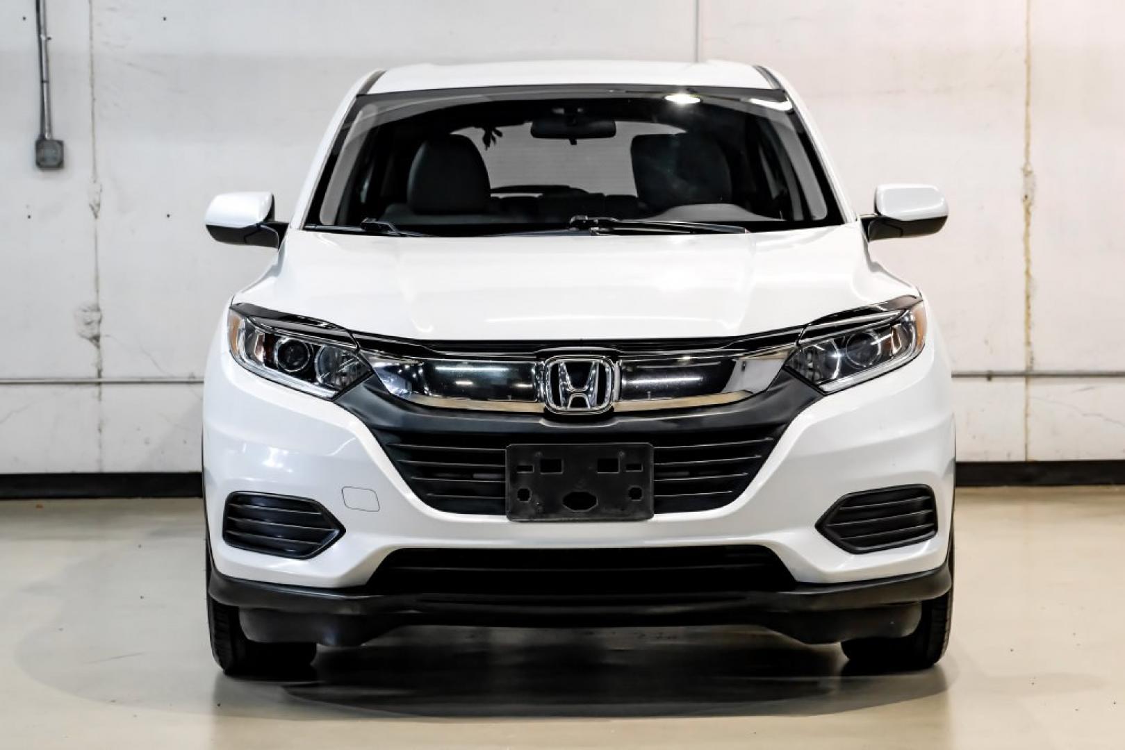 2020 Platinum White Pearl /Gray Honda HR-V LX (3CZRU6H30LM) with an 1.8L I4 SOHC 16V i-VTEC engine, CVT transmission, located at 15300 Midway Rd., Addison, TX, 75001, (972) 702-0011, 32.958321, -96.838074- Photo#4