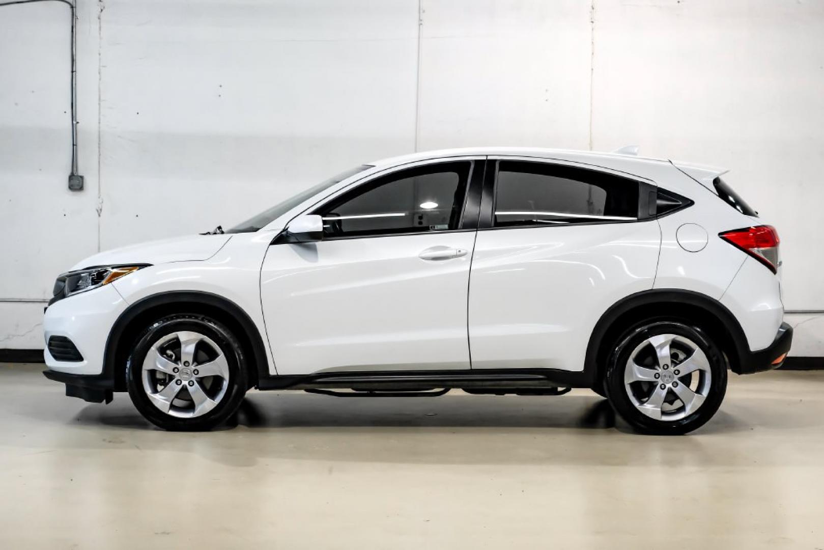 2020 Platinum White Pearl /Gray Honda HR-V LX (3CZRU6H30LM) with an 1.8L I4 SOHC 16V i-VTEC engine, CVT transmission, located at 15300 Midway Rd., Addison, TX, 75001, (972) 702-0011, 32.958321, -96.838074- Photo#10