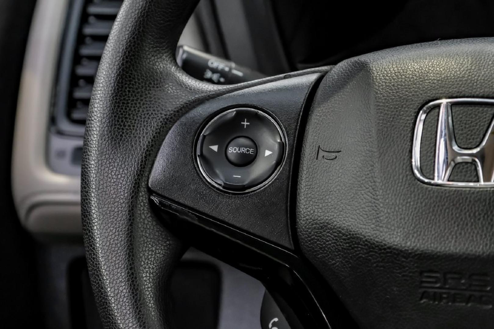 2020 Platinum White Pearl /Gray Honda HR-V LX (3CZRU6H30LM) with an 1.8L I4 SOHC 16V i-VTEC engine, CVT transmission, located at 15300 Midway Rd., Addison, TX, 75001, (972) 702-0011, 32.958321, -96.838074- Photo#16