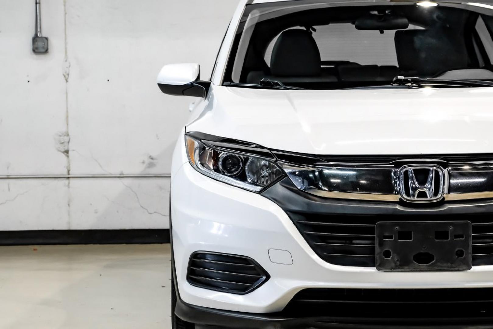 2020 Platinum White Pearl /Gray Honda HR-V LX (3CZRU6H30LM) with an 1.8L I4 SOHC 16V i-VTEC engine, CVT transmission, located at 15300 Midway Rd., Addison, TX, 75001, (972) 702-0011, 32.958321, -96.838074- Photo#42