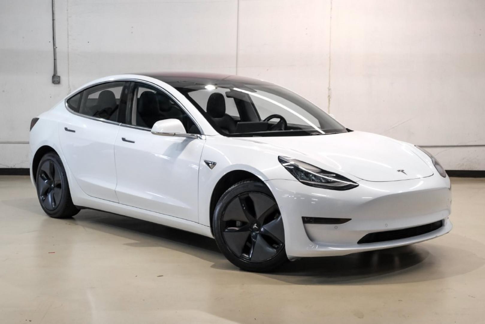 2018 Pearl White Multi-Coat /Black Tesla Model 3 Long Range (5YJ3E1EAXJF) with an Electric Motor engine, Automatic transmission, located at 15300 Midway Rd., Addison, TX, 75001, (972) 702-0011, 32.958321, -96.838074- Photo#5