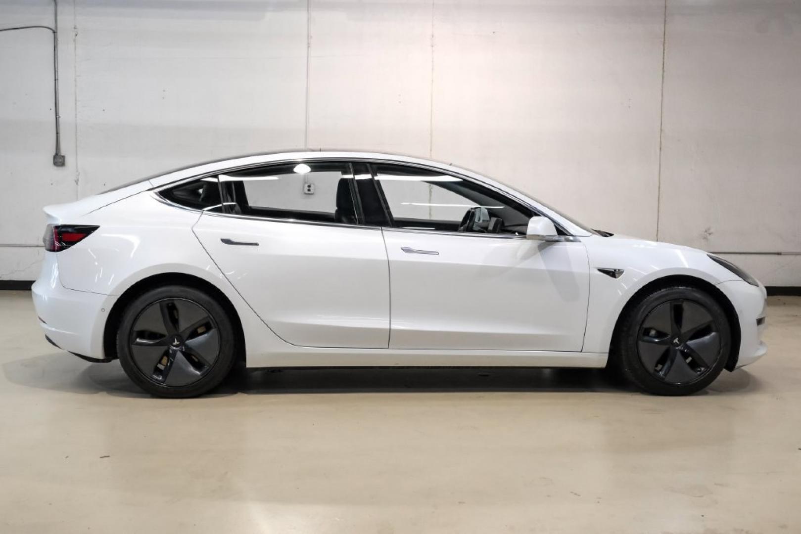 2018 Pearl White Multi-Coat /Black Tesla Model 3 Long Range (5YJ3E1EAXJF) with an Electric Motor engine, Automatic transmission, located at 15300 Midway Rd., Addison, TX, 75001, (972) 702-0011, 32.958321, -96.838074- Photo#6