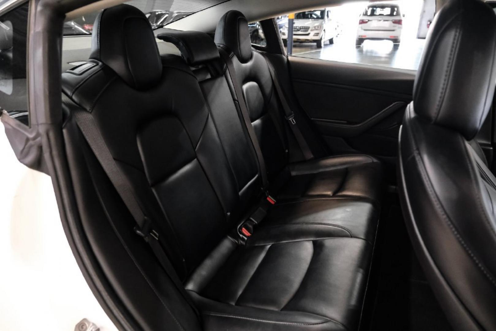 2018 Pearl White Multi-Coat /Black Tesla Model 3 Long Range (5YJ3E1EAXJF) with an Electric Motor engine, Automatic transmission, located at 15300 Midway Rd., Addison, TX, 75001, (972) 702-0011, 32.958321, -96.838074- Photo#27