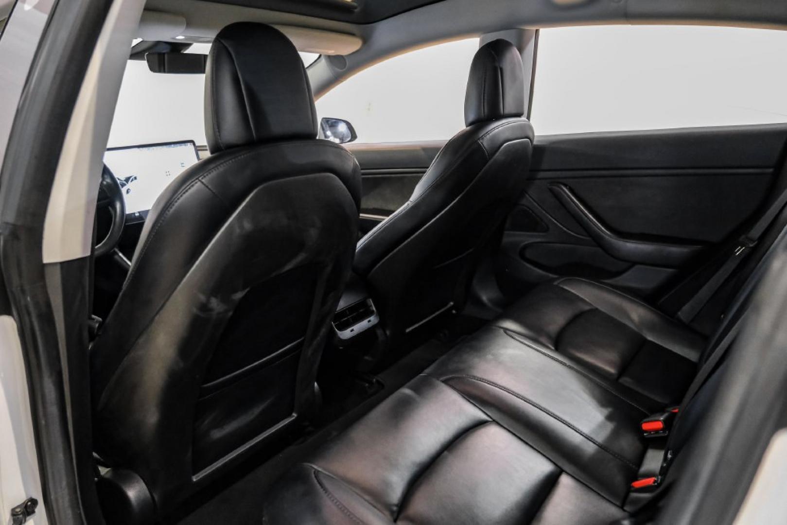 2018 Pearl White Multi-Coat /Black Tesla Model 3 Long Range (5YJ3E1EAXJF) with an Electric Motor engine, Automatic transmission, located at 15300 Midway Rd., Addison, TX, 75001, (972) 702-0011, 32.958321, -96.838074- Photo#28