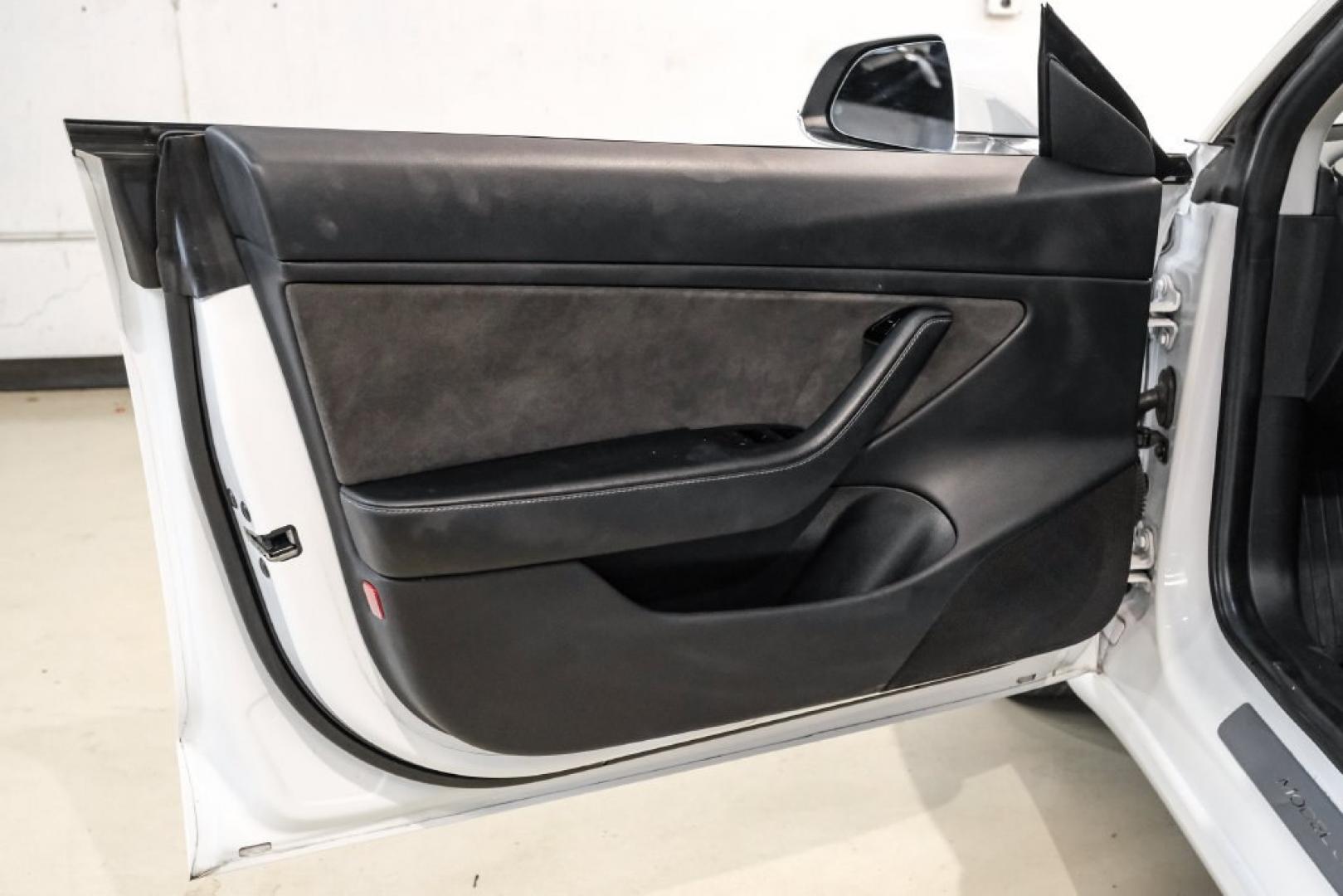 2018 Pearl White Multi-Coat /Black Tesla Model 3 Long Range (5YJ3E1EAXJF) with an Electric Motor engine, Automatic transmission, located at 15300 Midway Rd., Addison, TX, 75001, (972) 702-0011, 32.958321, -96.838074- Photo#32