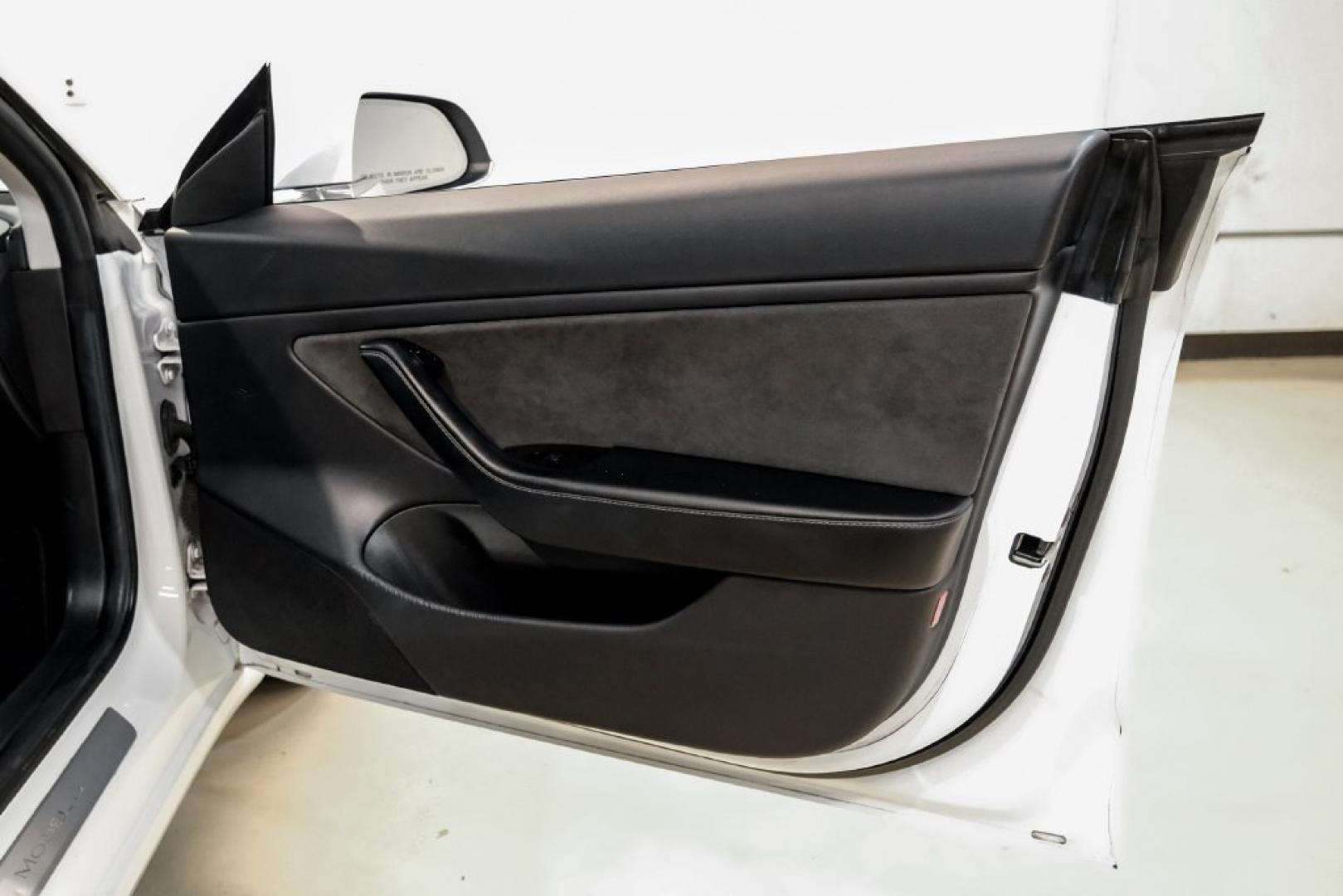 2018 Pearl White Multi-Coat /Black Tesla Model 3 Long Range (5YJ3E1EAXJF) with an Electric Motor engine, Automatic transmission, located at 15300 Midway Rd., Addison, TX, 75001, (972) 702-0011, 32.958321, -96.838074- Photo#34