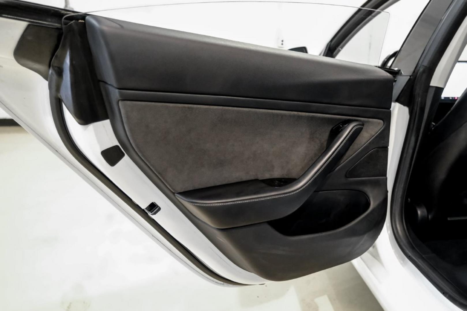 2018 Pearl White Multi-Coat /Black Tesla Model 3 Long Range (5YJ3E1EAXJF) with an Electric Motor engine, Automatic transmission, located at 15300 Midway Rd., Addison, TX, 75001, (972) 702-0011, 32.958321, -96.838074- Photo#35