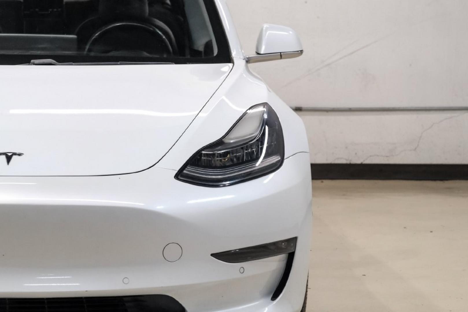 2018 Pearl White Multi-Coat /Black Tesla Model 3 Long Range (5YJ3E1EAXJF) with an Electric Motor engine, Automatic transmission, located at 15300 Midway Rd., Addison, TX, 75001, (972) 702-0011, 32.958321, -96.838074- Photo#37