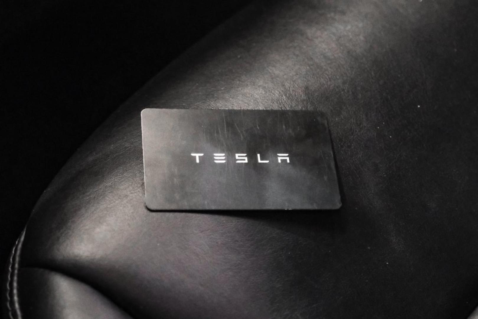 2018 Pearl White Multi-Coat /Black Tesla Model 3 Long Range (5YJ3E1EAXJF) with an Electric Motor engine, Automatic transmission, located at 15300 Midway Rd., Addison, TX, 75001, (972) 702-0011, 32.958321, -96.838074- Photo#47