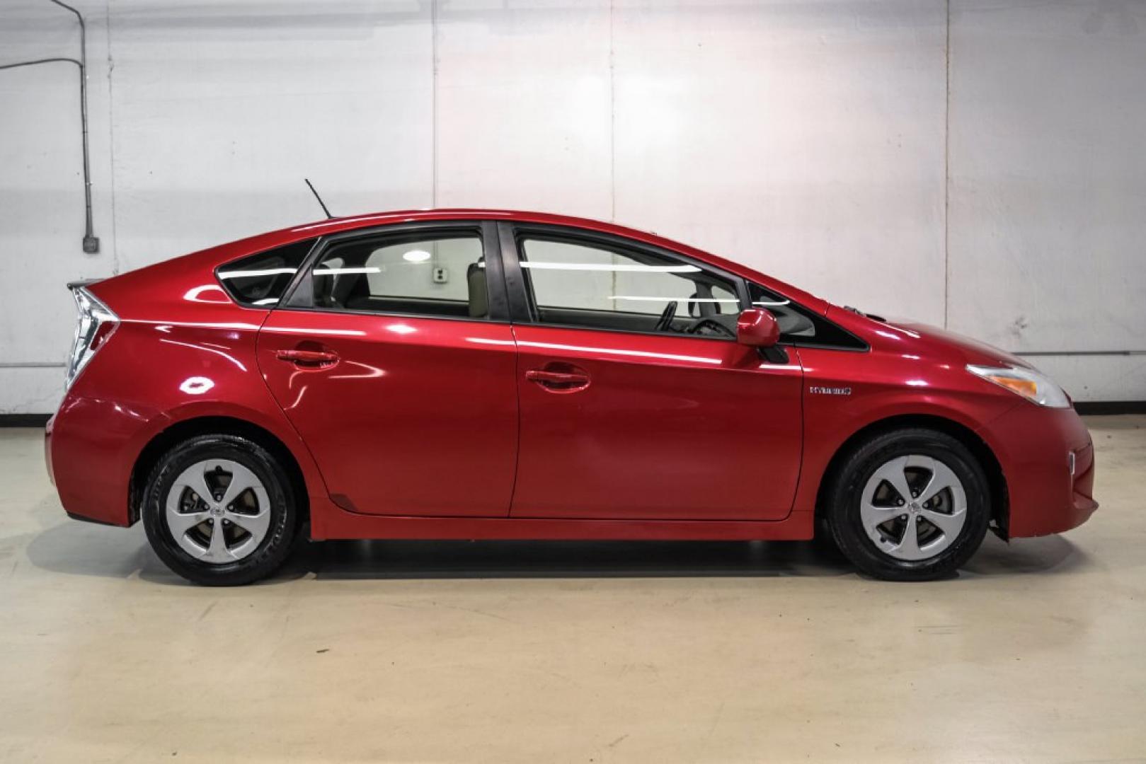 2012 Barcelona Red Metallic /Bisque Toyota Prius Four (JTDKN3DU9C1) with an 1.8L 4-Cylinder DOHC 16V VVT-i engine, CVT transmission, located at 15300 Midway Rd., Addison, TX, 75001, (972) 702-0011, 32.958321, -96.838074- Photo#7