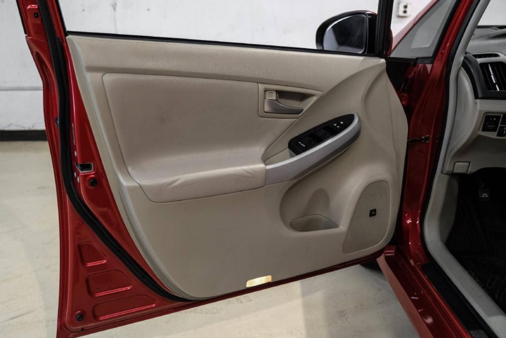2012 Barcelona Red Metallic /Bisque Toyota Prius Four (JTDKN3DU9C1) with an 1.8L 4-Cylinder DOHC 16V VVT-i engine, CVT transmission, located at 15300 Midway Rd., Addison, TX, 75001, (972) 702-0011, 32.958321, -96.838074- Photo#36
