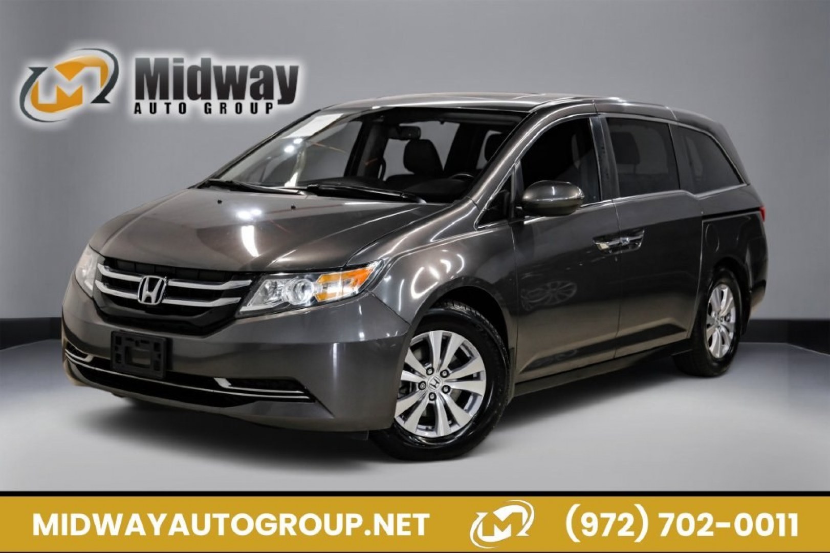 2015 Modern Steel Metallic /Beige Honda Odyssey EX-L (5FNRL5H62FB) with an 3.5L V6 SOHC i-VTEC 24V engine, Automatic transmission, located at 15300 Midway Rd., Addison, TX, 75001, (972) 702-0011, 32.958321, -96.838074- Photo#0