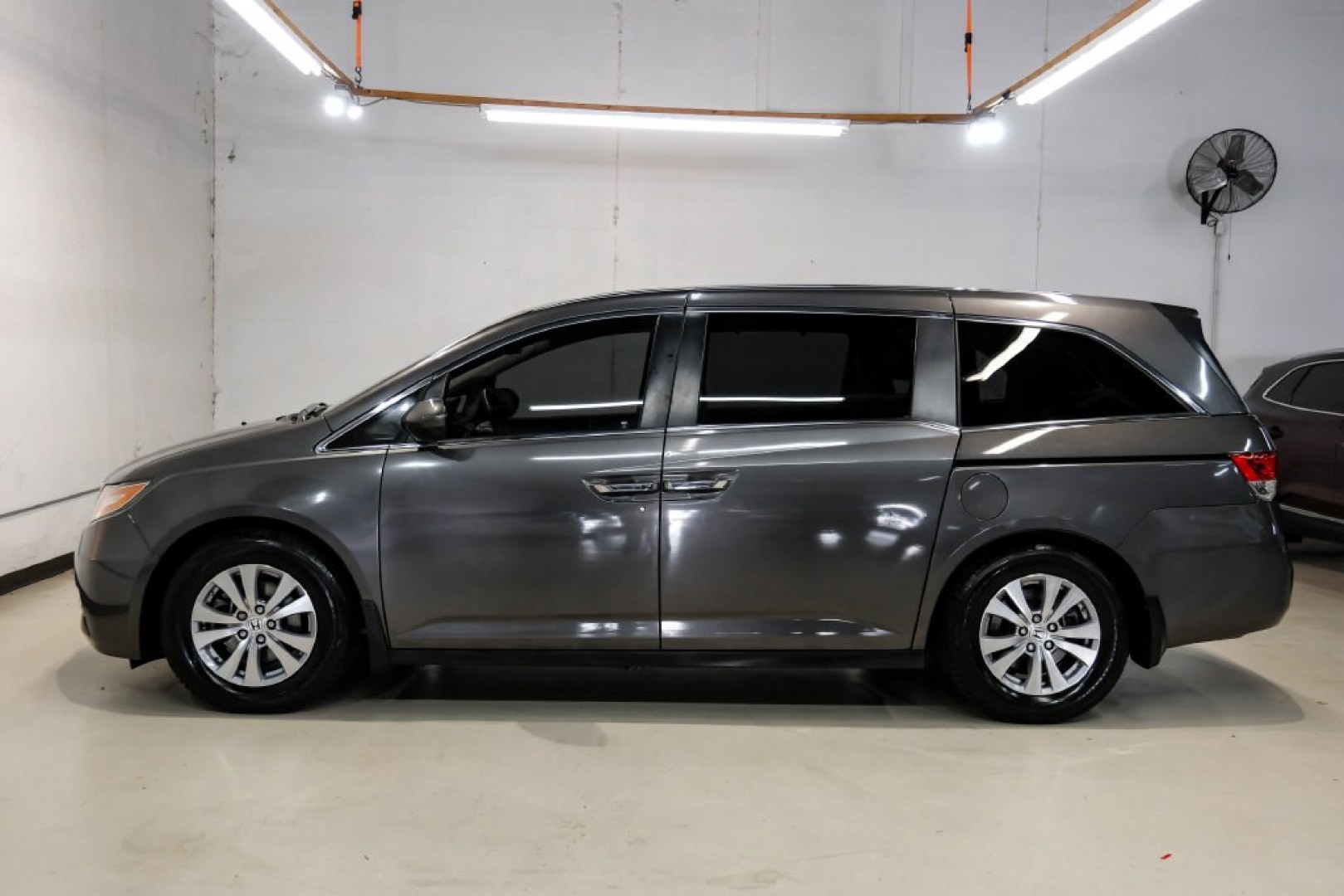 2015 Modern Steel Metallic /Beige Honda Odyssey EX-L (5FNRL5H62FB) with an 3.5L V6 SOHC i-VTEC 24V engine, Automatic transmission, located at 15300 Midway Rd., Addison, TX, 75001, (972) 702-0011, 32.958321, -96.838074- Photo#13