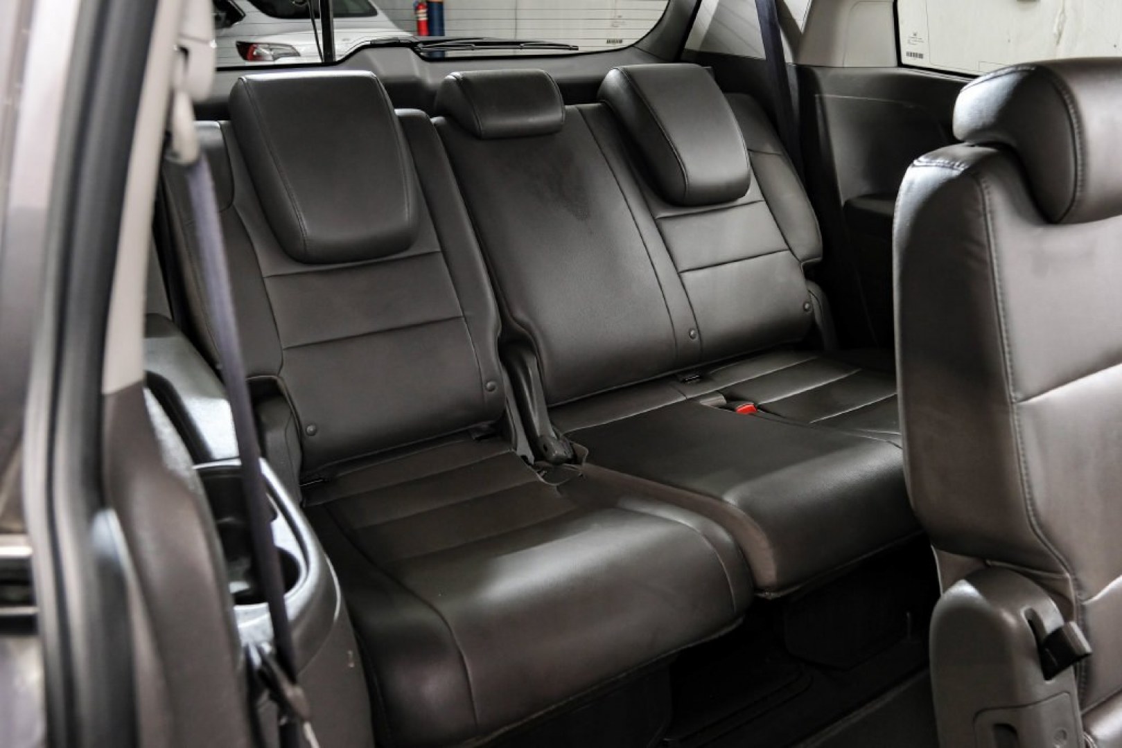 2015 Modern Steel Metallic /Beige Honda Odyssey EX-L (5FNRL5H62FB) with an 3.5L V6 SOHC i-VTEC 24V engine, Automatic transmission, located at 15300 Midway Rd., Addison, TX, 75001, (972) 702-0011, 32.958321, -96.838074- Photo#46