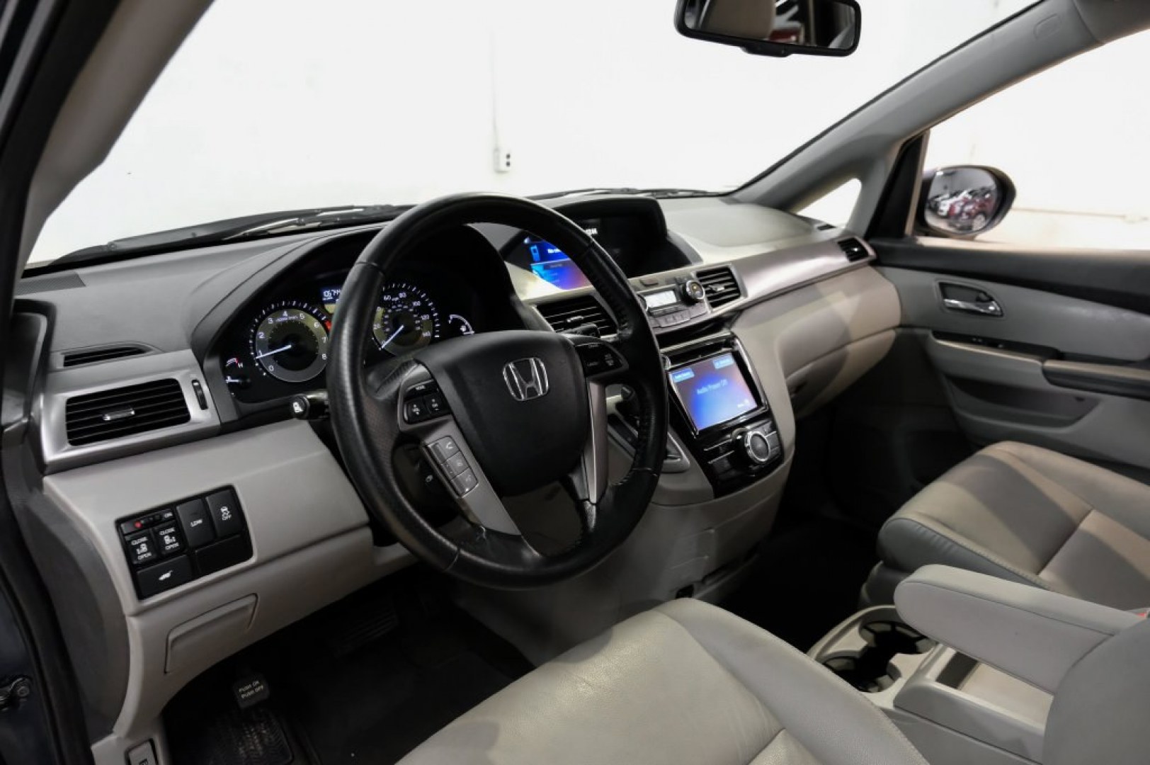 2016 Obsidian Blue Pearl /Gray Honda Odyssey EX-L (5FNRL5H60GB) with an 3.5L V6 SOHC i-VTEC 24V engine, Automatic transmission, located at 15300 Midway Rd., Addison, TX, 75001, (972) 702-0011, 32.958321, -96.838074- Photo#2