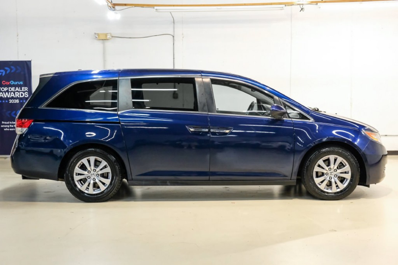 2016 Obsidian Blue Pearl /Gray Honda Odyssey EX-L (5FNRL5H60GB) with an 3.5L V6 SOHC i-VTEC 24V engine, Automatic transmission, located at 15300 Midway Rd., Addison, TX, 75001, (972) 702-0011, 32.958321, -96.838074- Photo#9