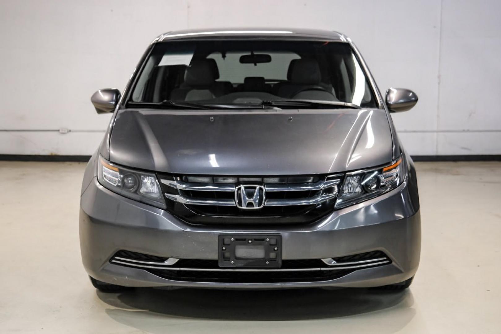 2016 Modern Steel Metallic /Beige Honda Odyssey SE (5FNRL5H35GB) with an 3.5L V6 SOHC i-VTEC 24V engine, Automatic transmission, located at 15300 Midway Rd., Addison, TX, 75001, (972) 702-0011, 32.958321, -96.838074- Photo#4