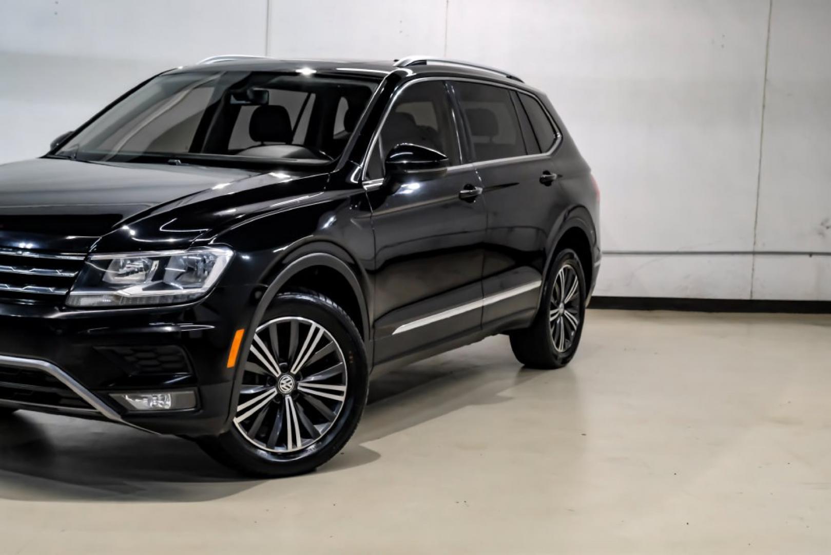 2018 Pearl Metallic /Titan Black Volkswagen Tiguan 2.0T SEL (3VV2B7AX1JM) with an 2.0L TSI DOHC engine, Automatic transmission, located at 15300 Midway Rd., Addison, TX, 75001, (972) 702-0011, 32.958321, -96.838074- Photo#6