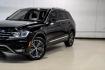2018 Pearl Metallic /Titan Black Volkswagen Tiguan 2.0T SEL (3VV2B7AX1JM) with an 2.0L TSI DOHC engine, Automatic transmission, located at 15300 Midway Rd., Addison, TX, 75001, (972) 702-0011, 32.958321, -96.838074- Photo#6