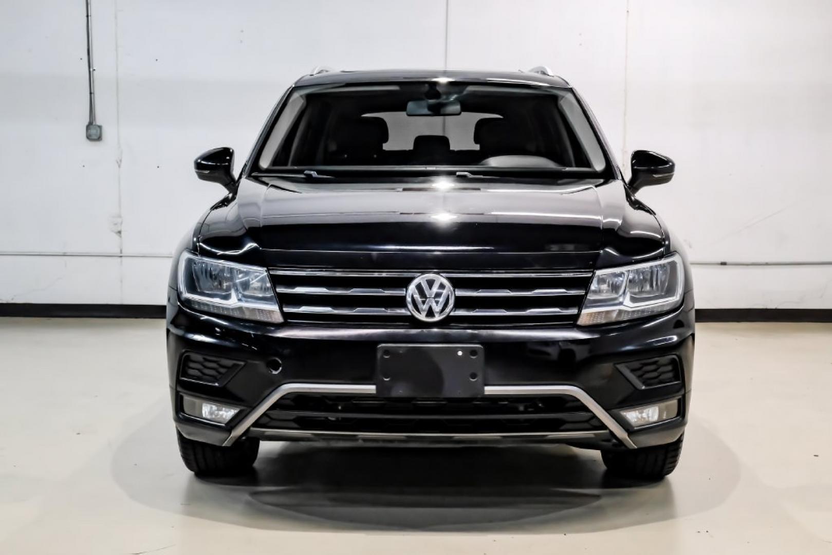 2018 Pearl Metallic /Titan Black Volkswagen Tiguan 2.0T SEL (3VV2B7AX1JM) with an 2.0L TSI DOHC engine, Automatic transmission, located at 15300 Midway Rd., Addison, TX, 75001, (972) 702-0011, 32.958321, -96.838074- Photo#7