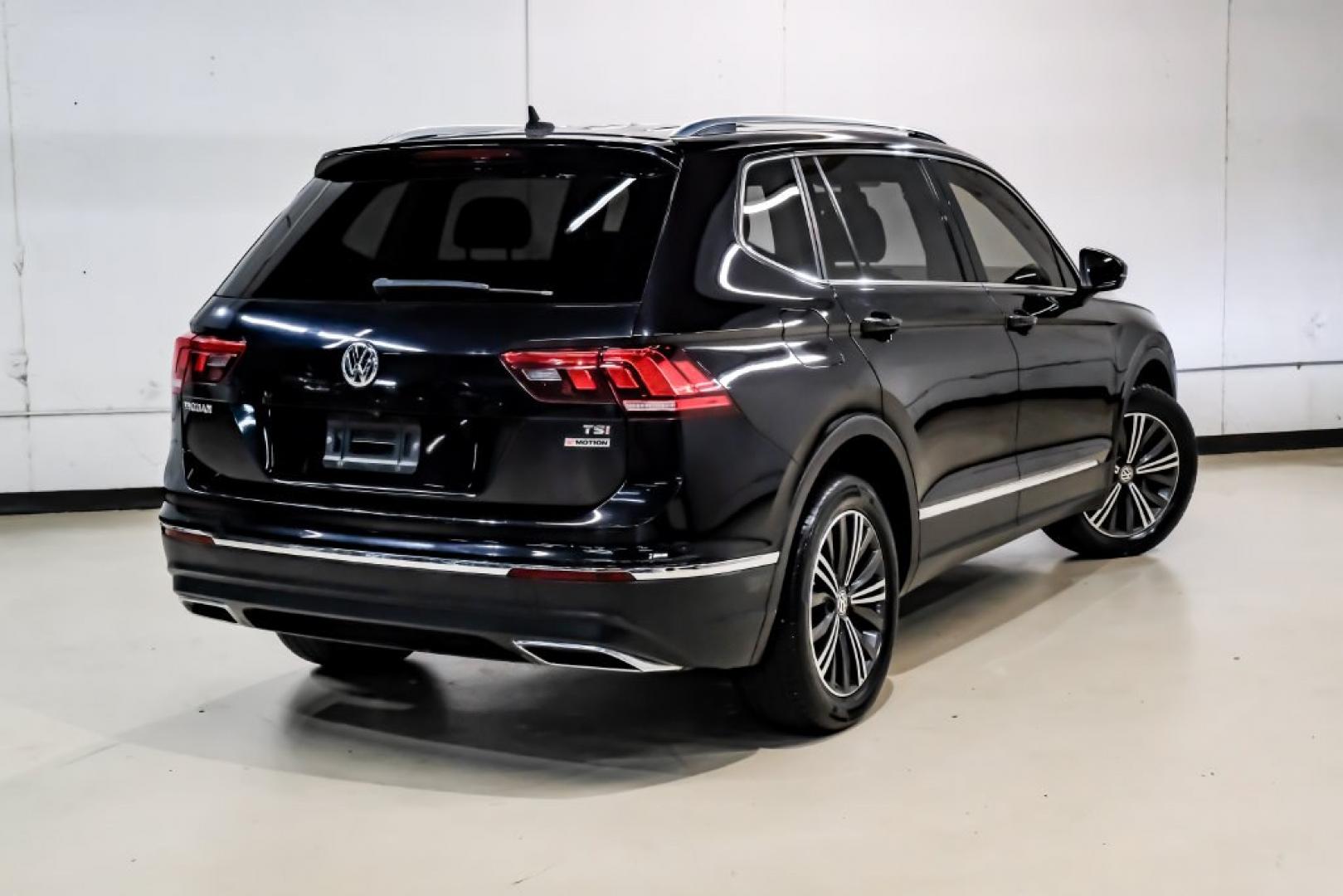 2018 Pearl Metallic /Titan Black Volkswagen Tiguan 2.0T SEL (3VV2B7AX1JM) with an 2.0L TSI DOHC engine, Automatic transmission, located at 15300 Midway Rd., Addison, TX, 75001, (972) 702-0011, 32.958321, -96.838074- Photo#10