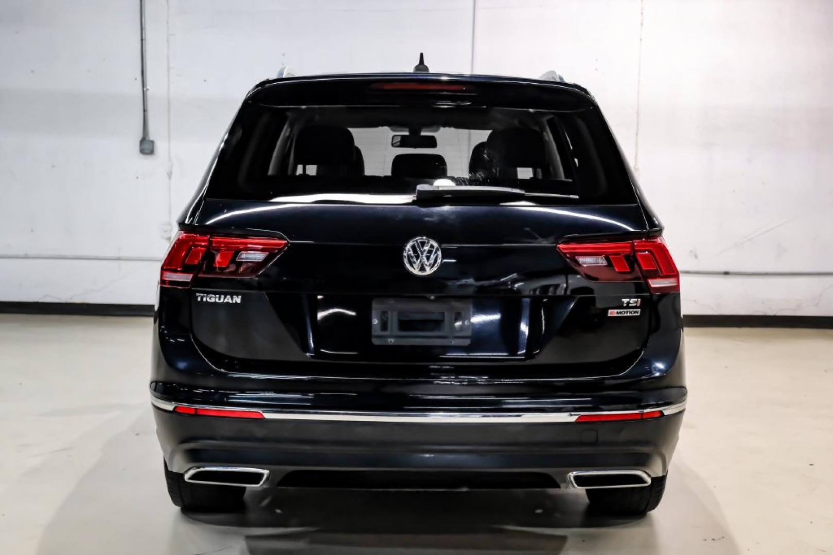 2018 Pearl Metallic /Titan Black Volkswagen Tiguan 2.0T SEL (3VV2B7AX1JM) with an 2.0L TSI DOHC engine, Automatic transmission, located at 15300 Midway Rd., Addison, TX, 75001, (972) 702-0011, 32.958321, -96.838074- Photo#11