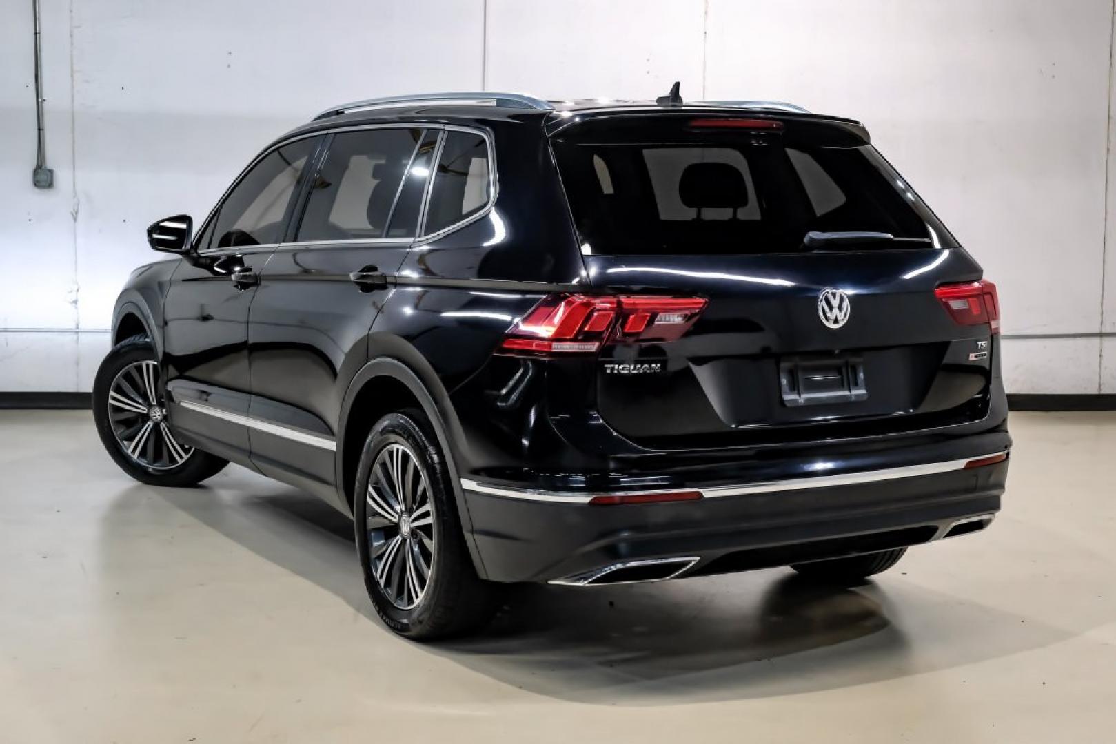 2018 Pearl Metallic /Titan Black Volkswagen Tiguan 2.0T SEL (3VV2B7AX1JM) with an 2.0L TSI DOHC engine, Automatic transmission, located at 15300 Midway Rd., Addison, TX, 75001, (972) 702-0011, 32.958321, -96.838074- Photo#12