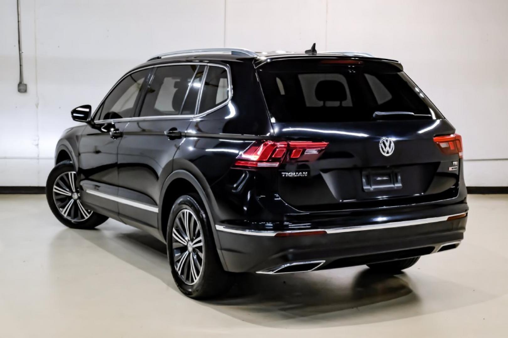 2018 Pearl Metallic /Titan Black Volkswagen Tiguan 2.0T SEL (3VV2B7AX1JM) with an 2.0L TSI DOHC engine, Automatic transmission, located at 15300 Midway Rd., Addison, TX, 75001, (972) 702-0011, 32.958321, -96.838074- Photo#13