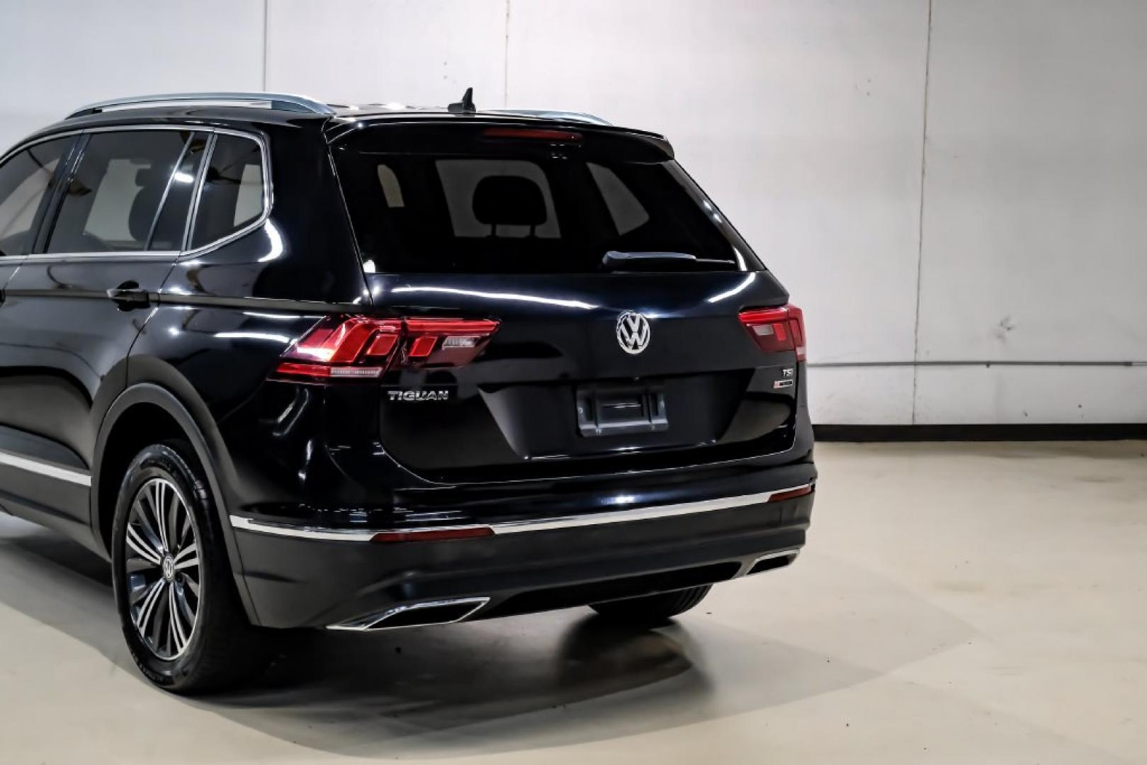 2018 Pearl Metallic /Titan Black Volkswagen Tiguan 2.0T SEL (3VV2B7AX1JM) with an 2.0L TSI DOHC engine, Automatic transmission, located at 15300 Midway Rd., Addison, TX, 75001, (972) 702-0011, 32.958321, -96.838074- Photo#14