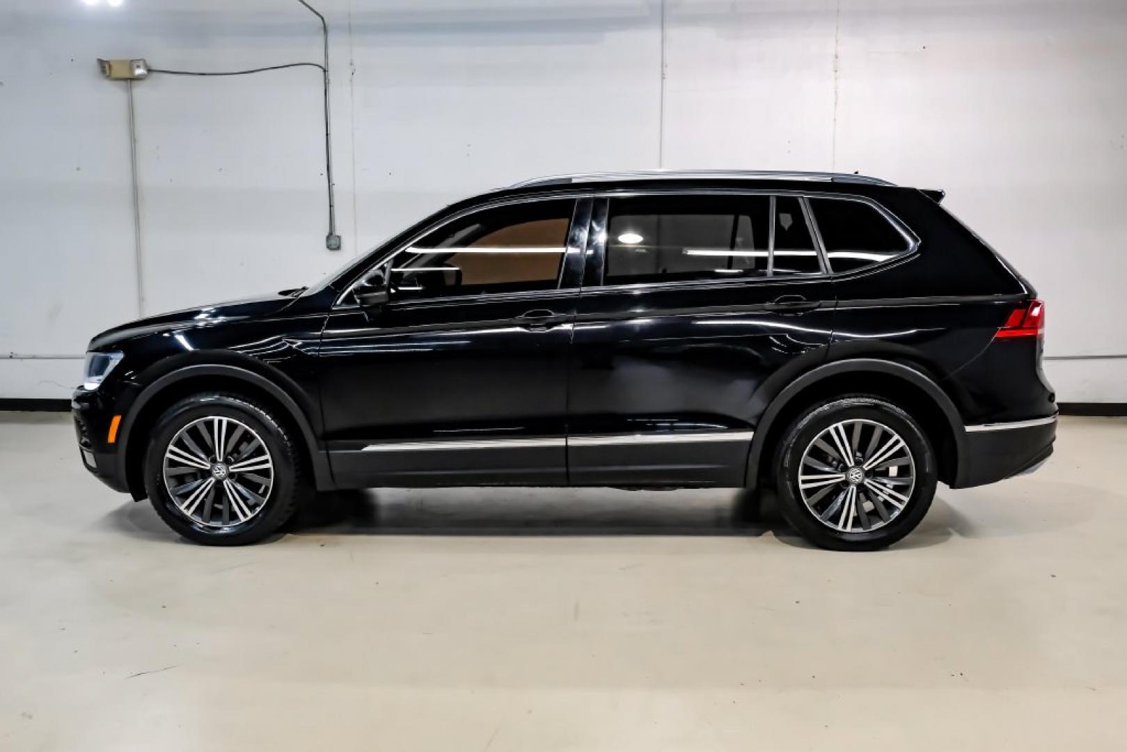 2018 Pearl Metallic /Titan Black Volkswagen Tiguan 2.0T SEL (3VV2B7AX1JM) with an 2.0L TSI DOHC engine, Automatic transmission, located at 15300 Midway Rd., Addison, TX, 75001, (972) 702-0011, 32.958321, -96.838074- Photo#15