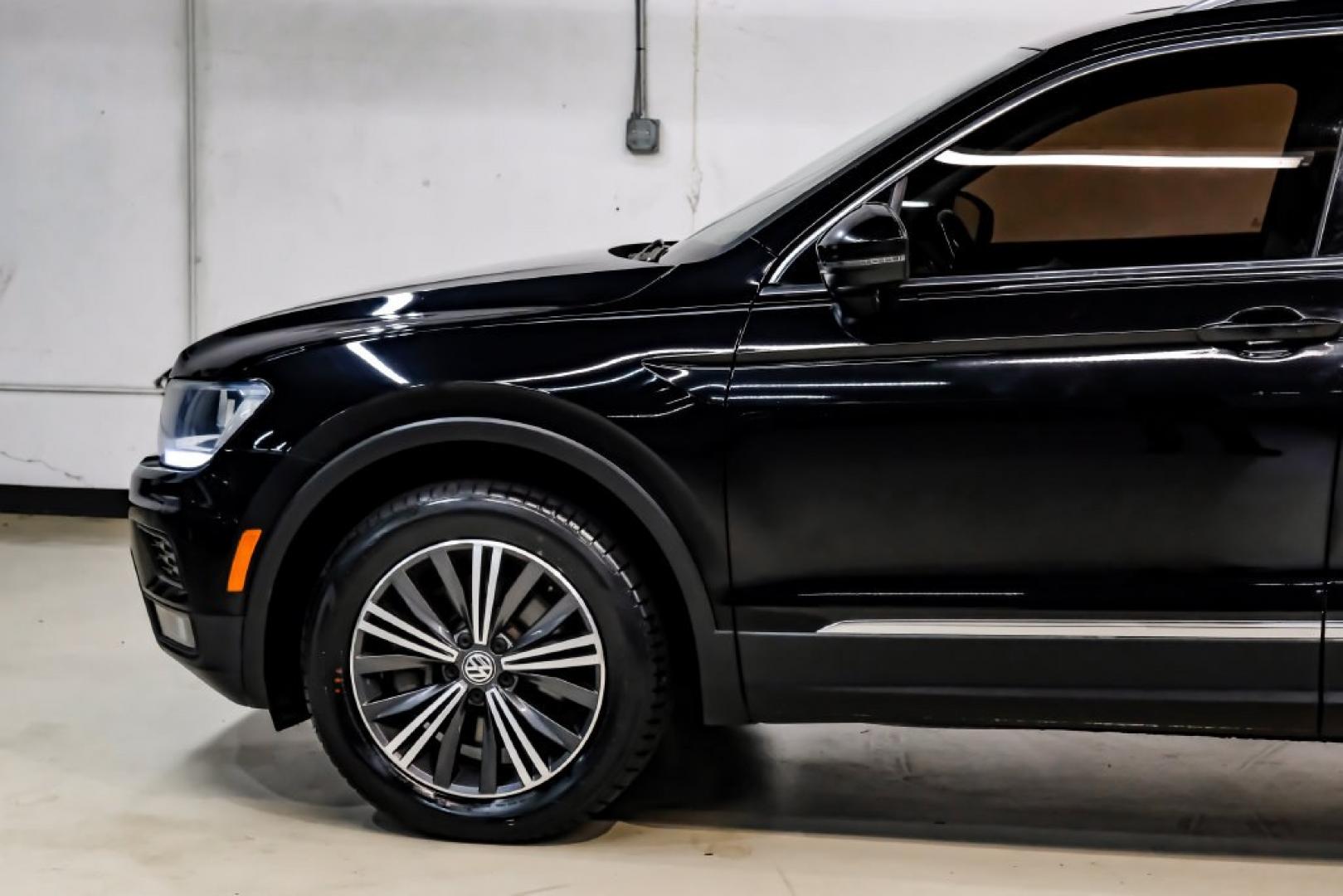 2018 Pearl Metallic /Titan Black Volkswagen Tiguan 2.0T SEL (3VV2B7AX1JM) with an 2.0L TSI DOHC engine, Automatic transmission, located at 15300 Midway Rd., Addison, TX, 75001, (972) 702-0011, 32.958321, -96.838074- Photo#16