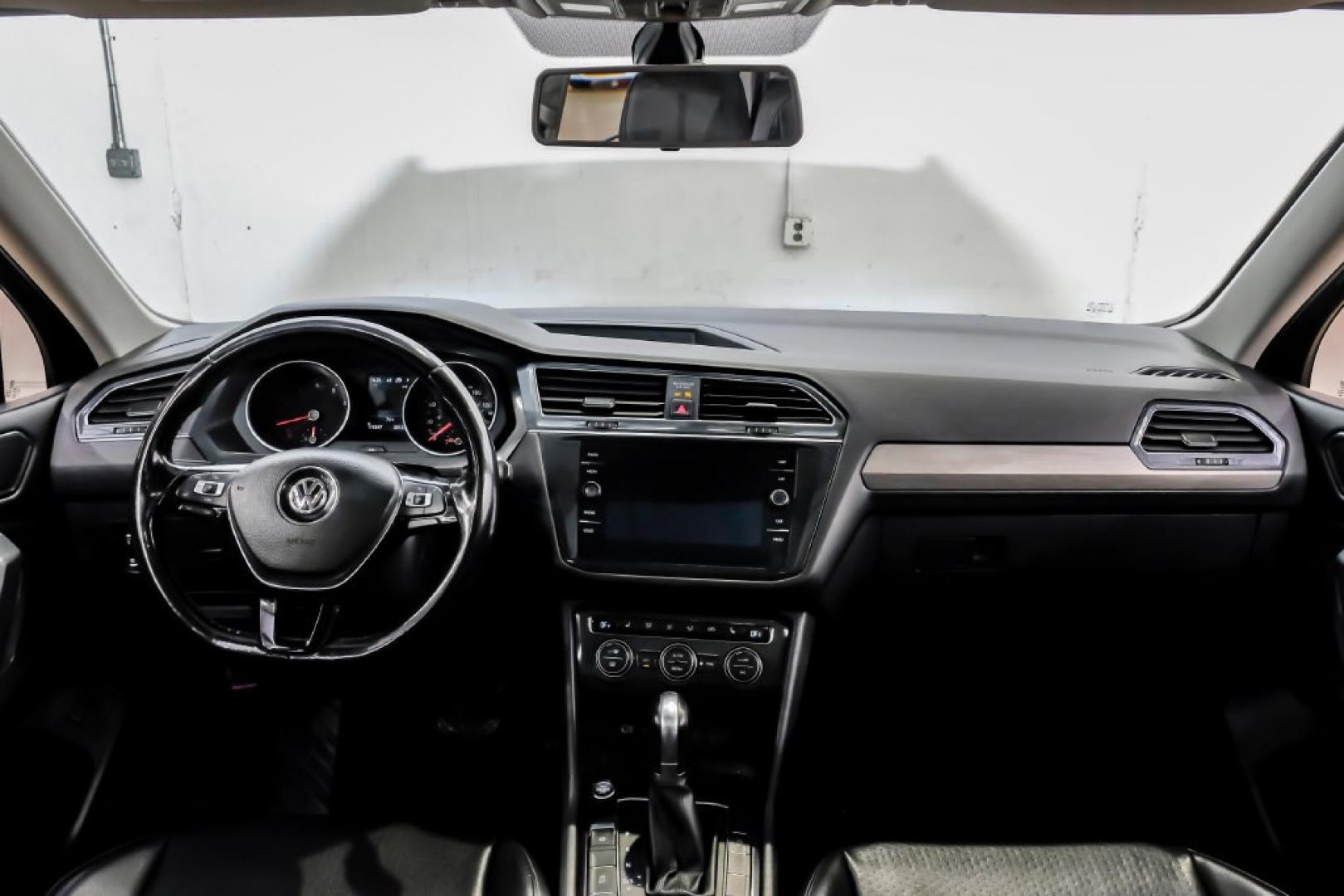 2018 Pearl Metallic /Titan Black Volkswagen Tiguan 2.0T SEL (3VV2B7AX1JM) with an 2.0L TSI DOHC engine, Automatic transmission, located at 15300 Midway Rd., Addison, TX, 75001, (972) 702-0011, 32.958321, -96.838074- Photo#19