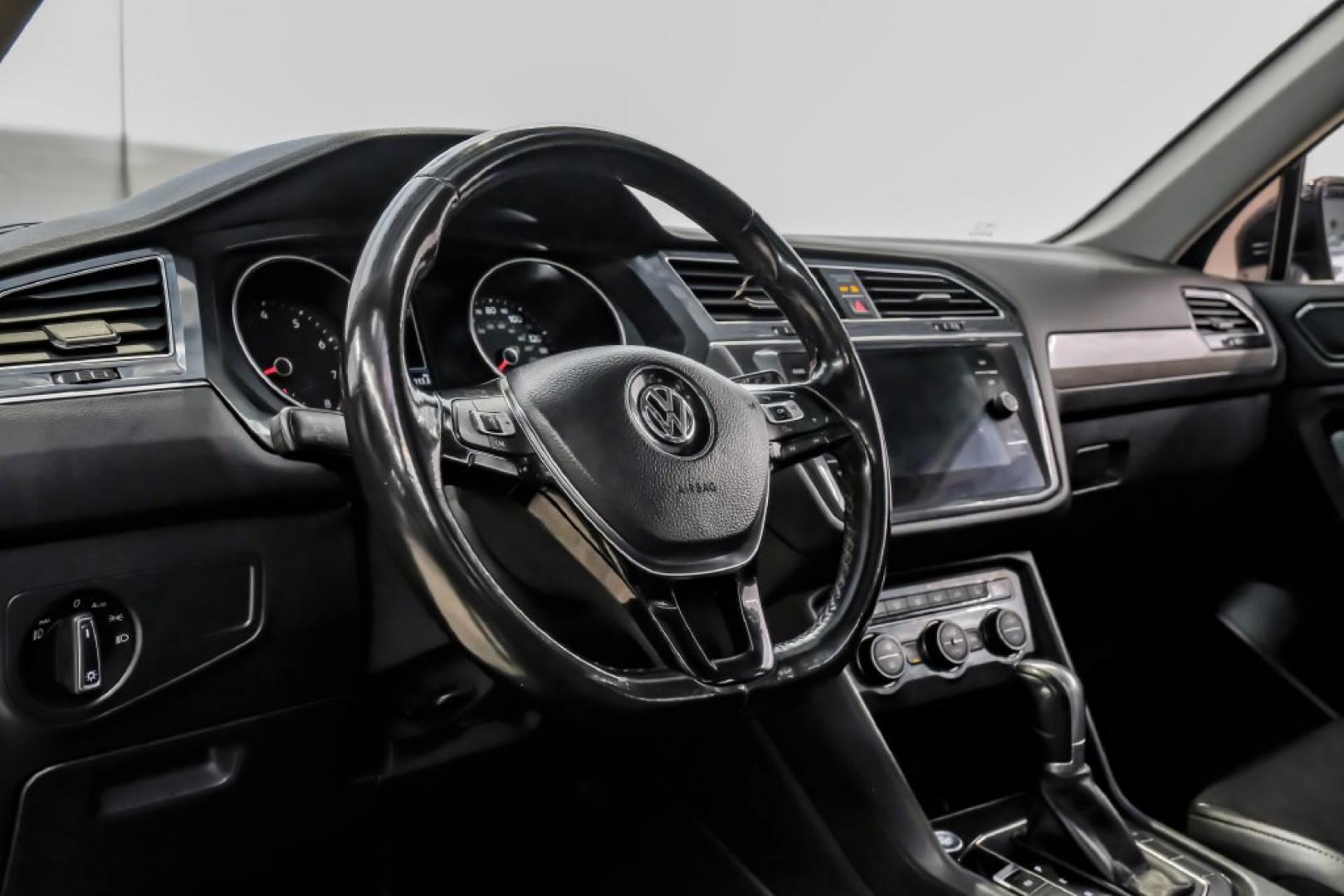 2018 Pearl Metallic /Titan Black Volkswagen Tiguan 2.0T SEL (3VV2B7AX1JM) with an 2.0L TSI DOHC engine, Automatic transmission, located at 15300 Midway Rd., Addison, TX, 75001, (972) 702-0011, 32.958321, -96.838074- Photo#21