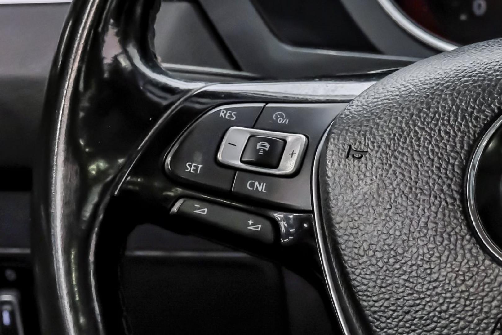 2018 Pearl Metallic /Titan Black Volkswagen Tiguan 2.0T SEL (3VV2B7AX1JM) with an 2.0L TSI DOHC engine, Automatic transmission, located at 15300 Midway Rd., Addison, TX, 75001, (972) 702-0011, 32.958321, -96.838074- Photo#22