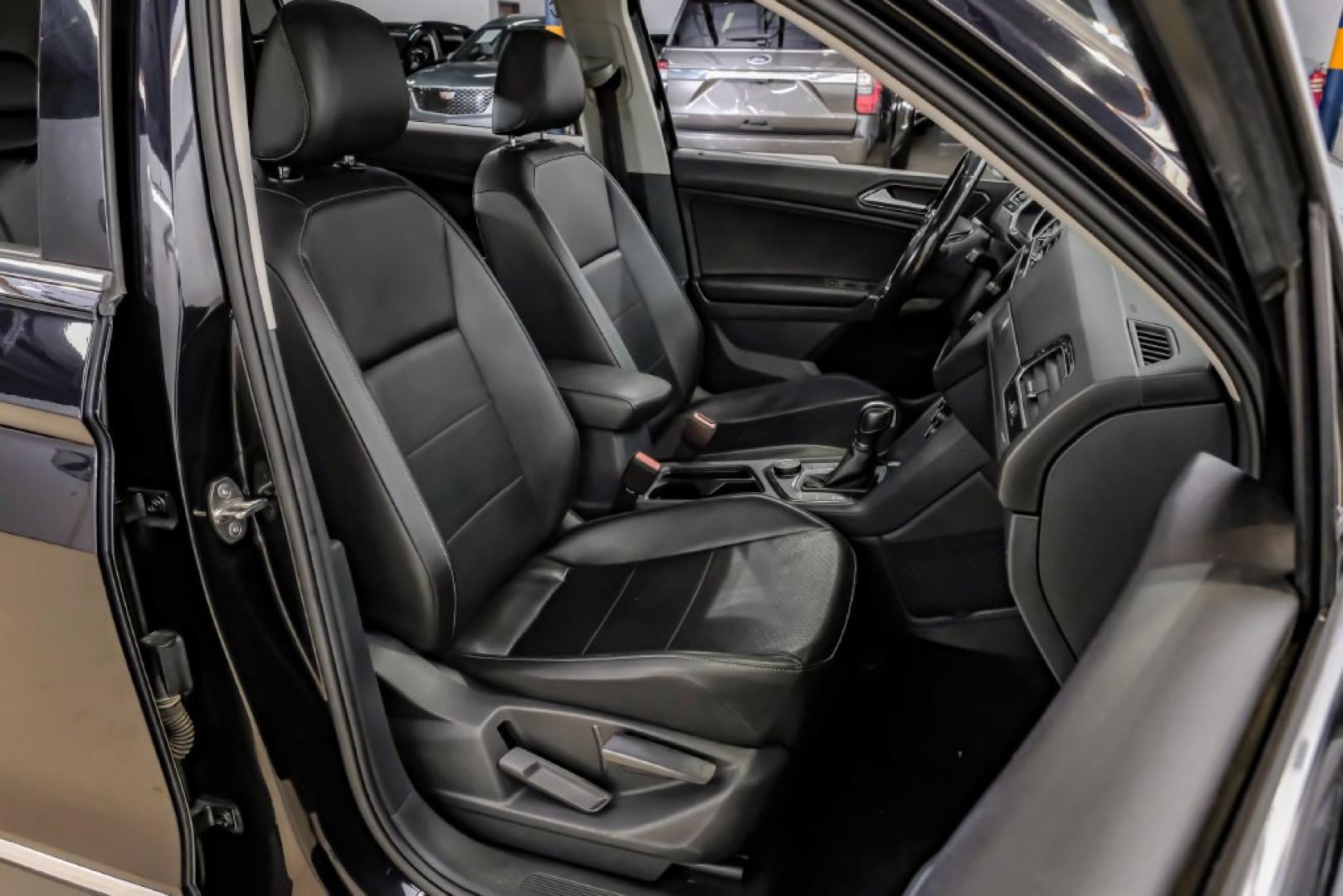 2018 Pearl Metallic /Titan Black Volkswagen Tiguan 2.0T SEL (3VV2B7AX1JM) with an 2.0L TSI DOHC engine, Automatic transmission, located at 15300 Midway Rd., Addison, TX, 75001, (972) 702-0011, 32.958321, -96.838074- Photo#44