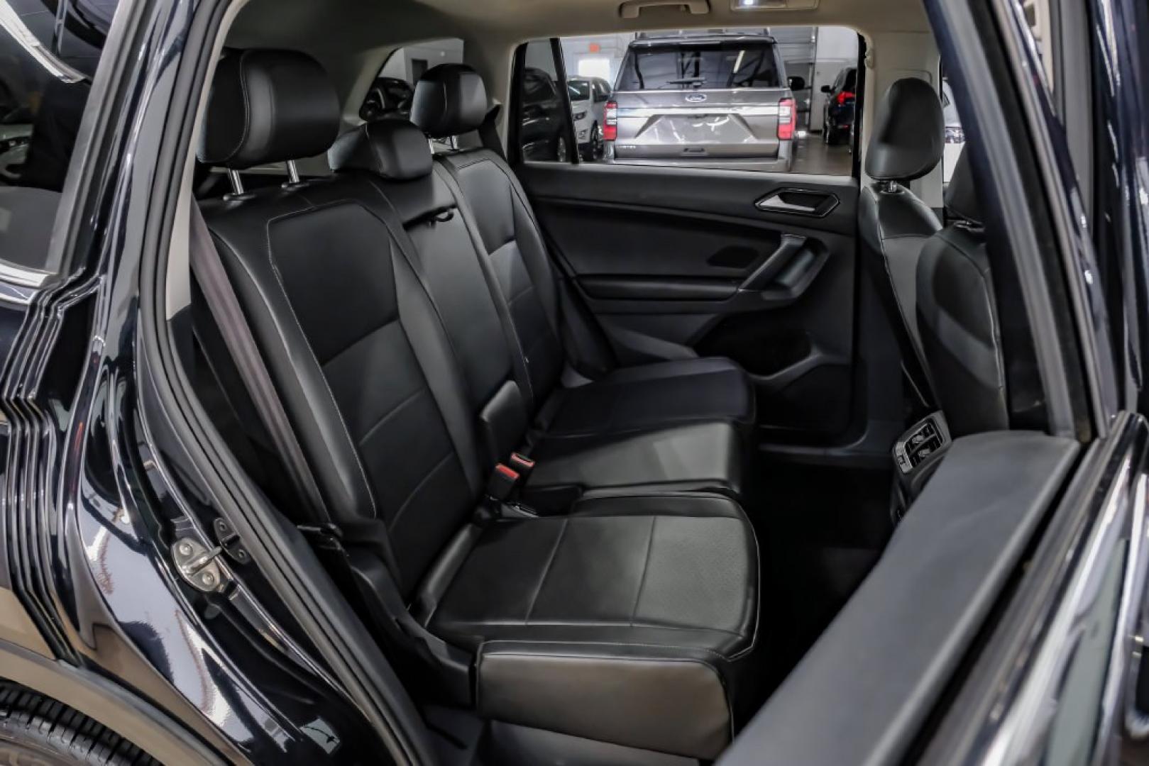 2018 Pearl Metallic /Titan Black Volkswagen Tiguan 2.0T SEL (3VV2B7AX1JM) with an 2.0L TSI DOHC engine, Automatic transmission, located at 15300 Midway Rd., Addison, TX, 75001, (972) 702-0011, 32.958321, -96.838074- Photo#45
