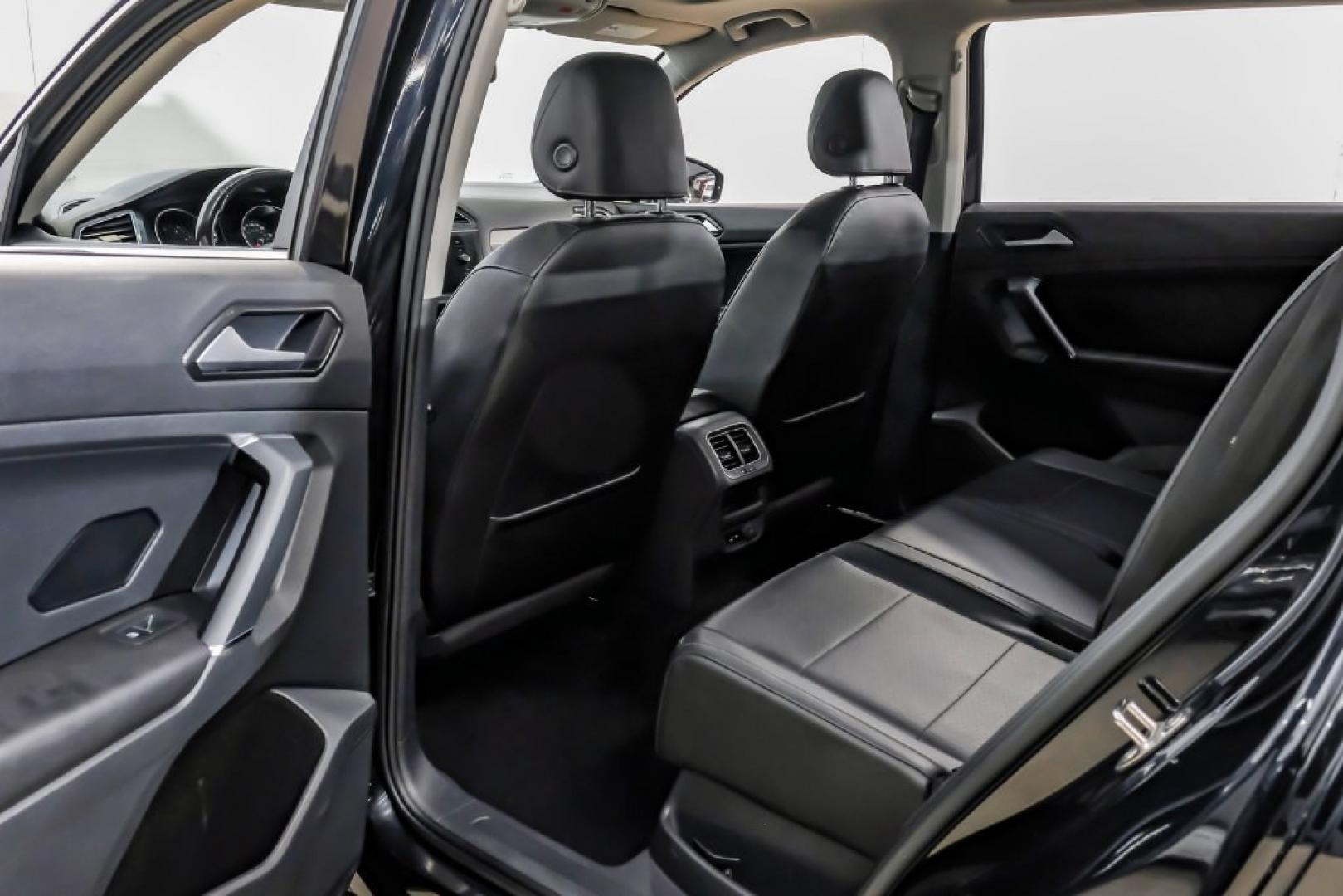 2018 Pearl Metallic /Titan Black Volkswagen Tiguan 2.0T SEL (3VV2B7AX1JM) with an 2.0L TSI DOHC engine, Automatic transmission, located at 15300 Midway Rd., Addison, TX, 75001, (972) 702-0011, 32.958321, -96.838074- Photo#48