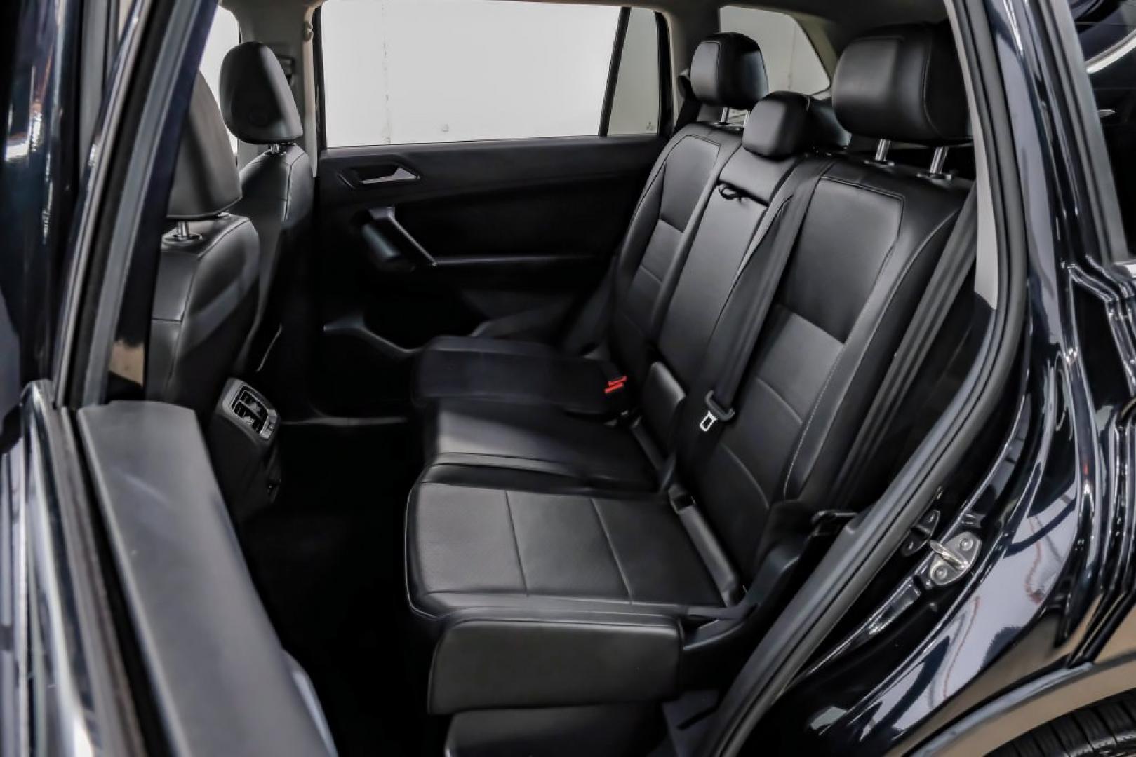 2018 Pearl Metallic /Titan Black Volkswagen Tiguan 2.0T SEL (3VV2B7AX1JM) with an 2.0L TSI DOHC engine, Automatic transmission, located at 15300 Midway Rd., Addison, TX, 75001, (972) 702-0011, 32.958321, -96.838074- Photo#49