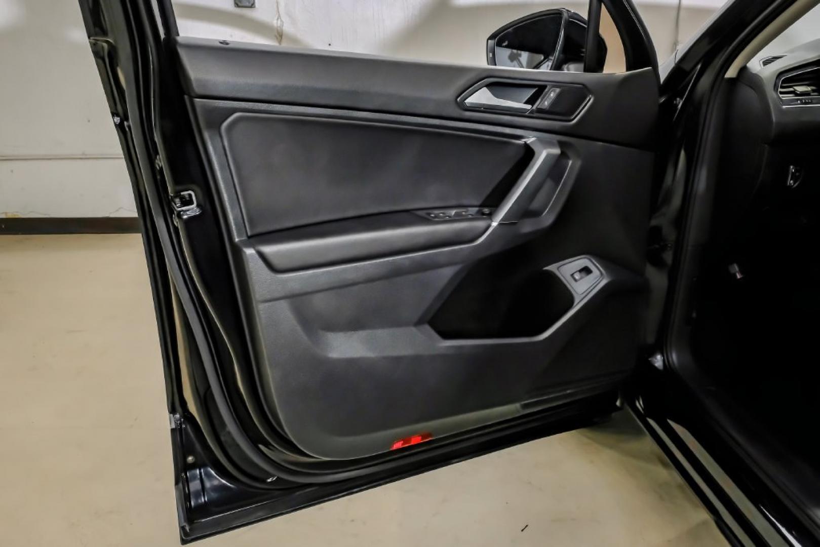 2018 Pearl Metallic /Titan Black Volkswagen Tiguan 2.0T SEL (3VV2B7AX1JM) with an 2.0L TSI DOHC engine, Automatic transmission, located at 15300 Midway Rd., Addison, TX, 75001, (972) 702-0011, 32.958321, -96.838074- Photo#52