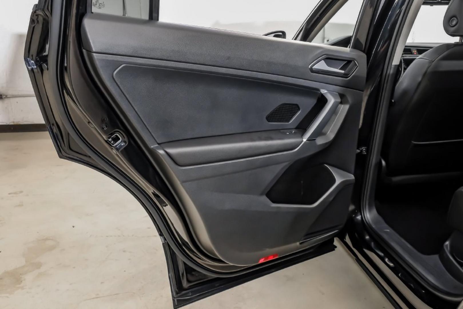 2018 Pearl Metallic /Titan Black Volkswagen Tiguan 2.0T SEL (3VV2B7AX1JM) with an 2.0L TSI DOHC engine, Automatic transmission, located at 15300 Midway Rd., Addison, TX, 75001, (972) 702-0011, 32.958321, -96.838074- Photo#55