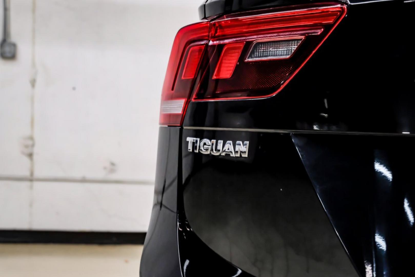 2018 Pearl Metallic /Titan Black Volkswagen Tiguan 2.0T SEL (3VV2B7AX1JM) with an 2.0L TSI DOHC engine, Automatic transmission, located at 15300 Midway Rd., Addison, TX, 75001, (972) 702-0011, 32.958321, -96.838074- Photo#59