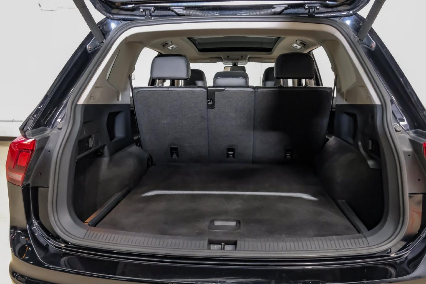 2018 Pearl Metallic /Titan Black Volkswagen Tiguan 2.0T SEL (3VV2B7AX1JM) with an 2.0L TSI DOHC engine, Automatic transmission, located at 15300 Midway Rd., Addison, TX, 75001, (972) 702-0011, 32.958321, -96.838074- Photo#65