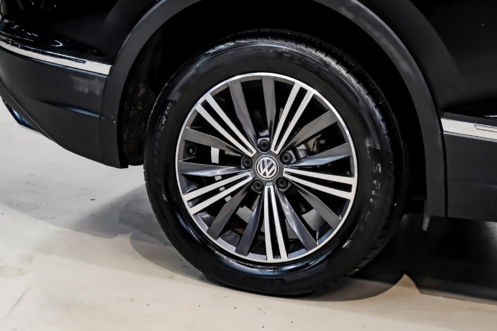 2018 Pearl Metallic /Titan Black Volkswagen Tiguan 2.0T SEL (3VV2B7AX1JM) with an 2.0L TSI DOHC engine, Automatic transmission, located at 15300 Midway Rd., Addison, TX, 75001, (972) 702-0011, 32.958321, -96.838074- Photo#68