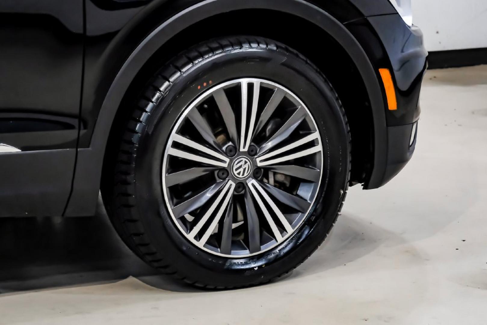 2018 Pearl Metallic /Titan Black Volkswagen Tiguan 2.0T SEL (3VV2B7AX1JM) with an 2.0L TSI DOHC engine, Automatic transmission, located at 15300 Midway Rd., Addison, TX, 75001, (972) 702-0011, 32.958321, -96.838074- Photo#69
