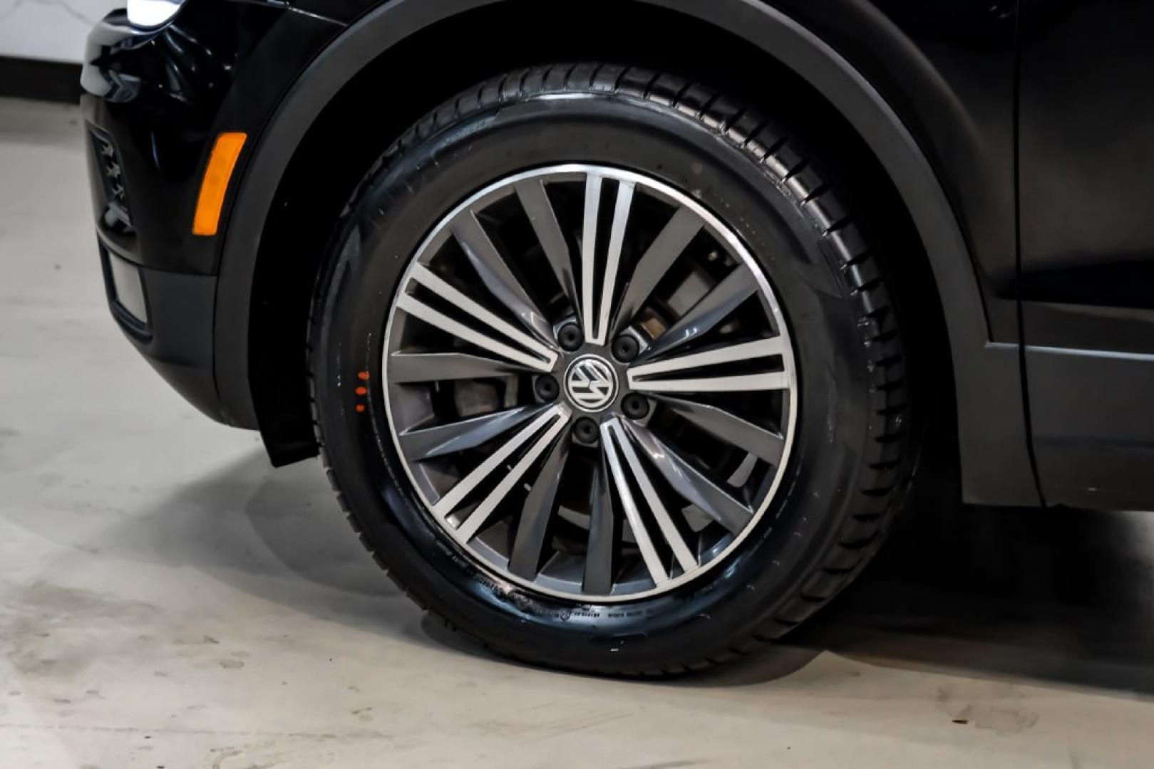 2018 Pearl Metallic /Titan Black Volkswagen Tiguan 2.0T SEL (3VV2B7AX1JM) with an 2.0L TSI DOHC engine, Automatic transmission, located at 15300 Midway Rd., Addison, TX, 75001, (972) 702-0011, 32.958321, -96.838074- Photo#70