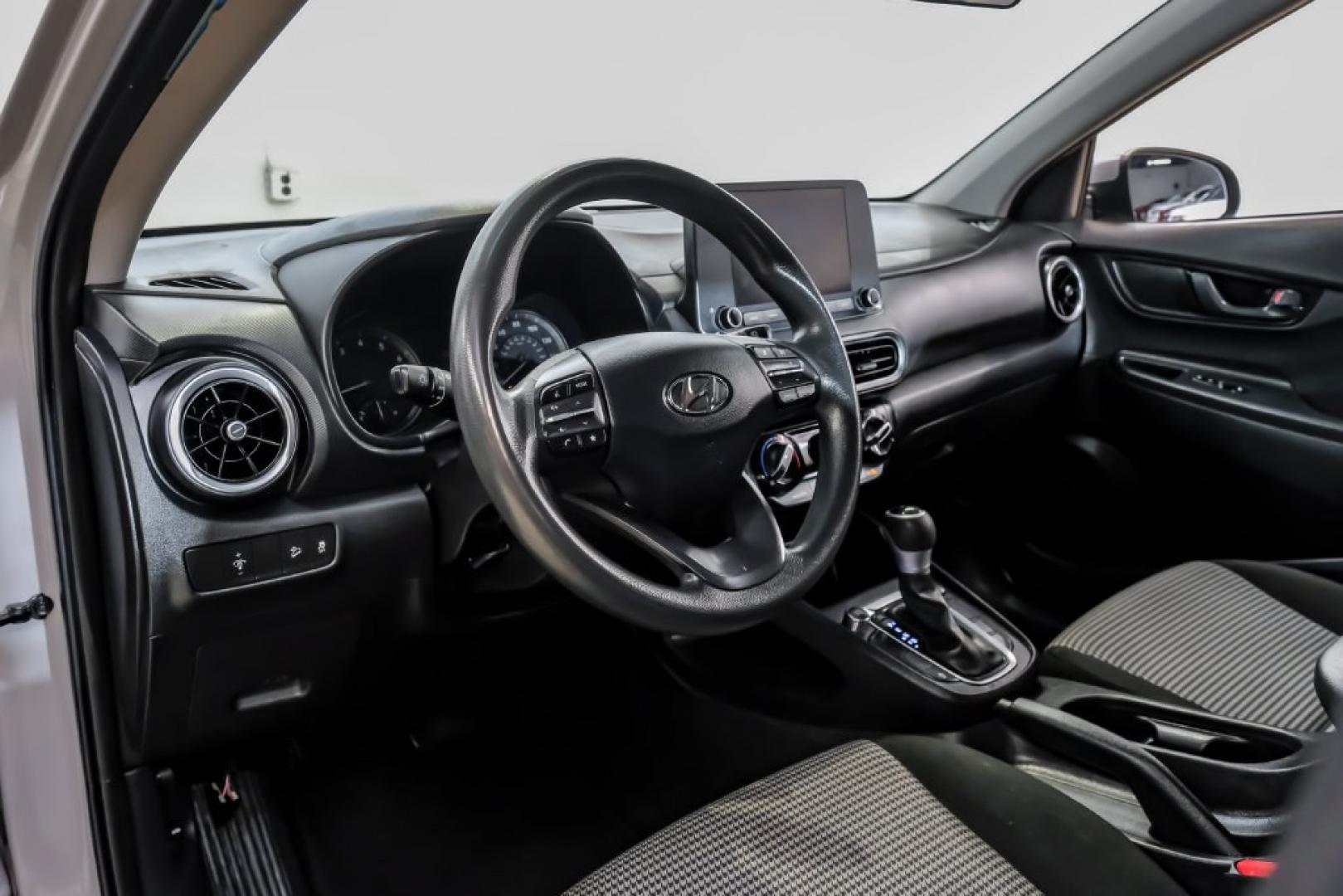2023 Silver /Black Hyundai Kona SE (KM8K22AB4PU) with an 2.0L I4 DOHC Dual CVVT engine, CVT transmission, located at 15300 Midway Rd., Addison, TX, 75001, (972) 702-0011, 32.958321, -96.838074- Photo#2