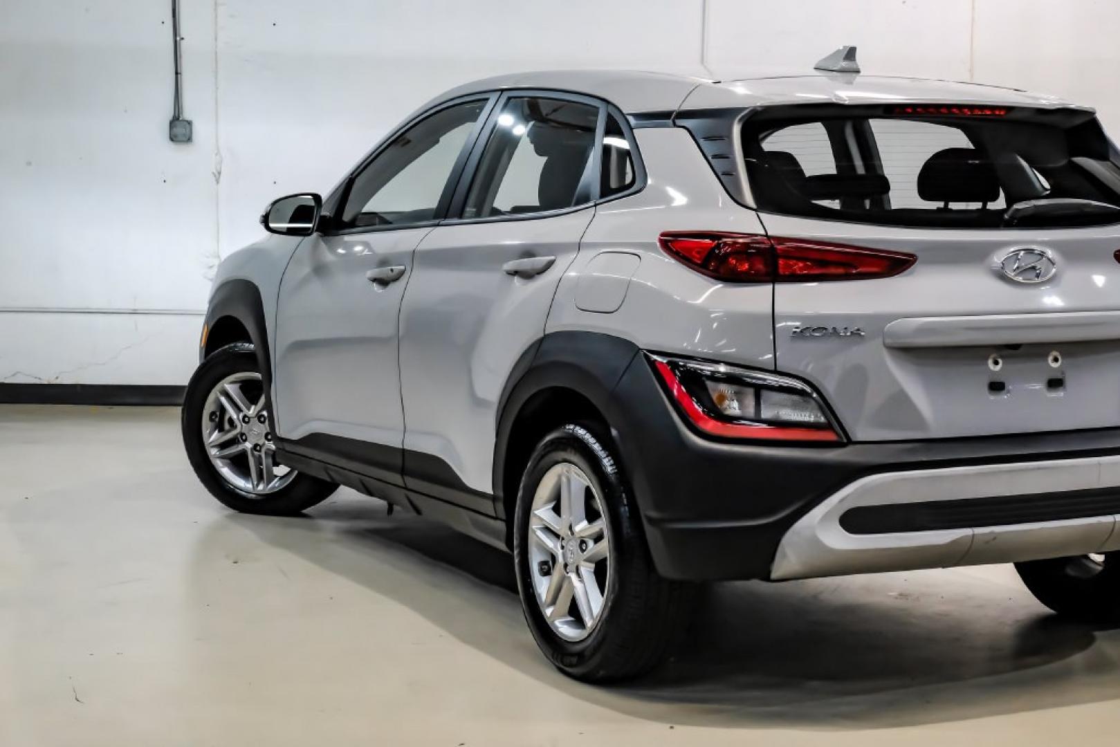 2023 Silver /Black Hyundai Kona SE (KM8K22AB4PU) with an 2.0L I4 DOHC Dual CVVT engine, CVT transmission, located at 15300 Midway Rd., Addison, TX, 75001, (972) 702-0011, 32.958321, -96.838074- Photo#12